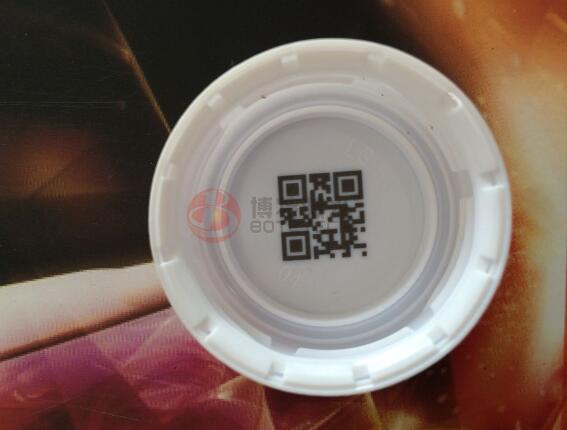 饮料瓶盖在线激光喷码机解决方案